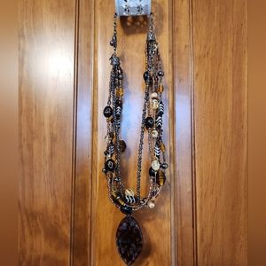 Glass Bead Necklace strung on Wire with heavy clasp.